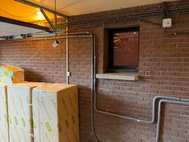 Travaux d’isolation fibre de bois dans un garage